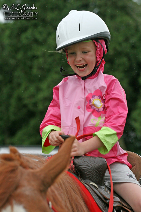 Girl Giddy on a Horse